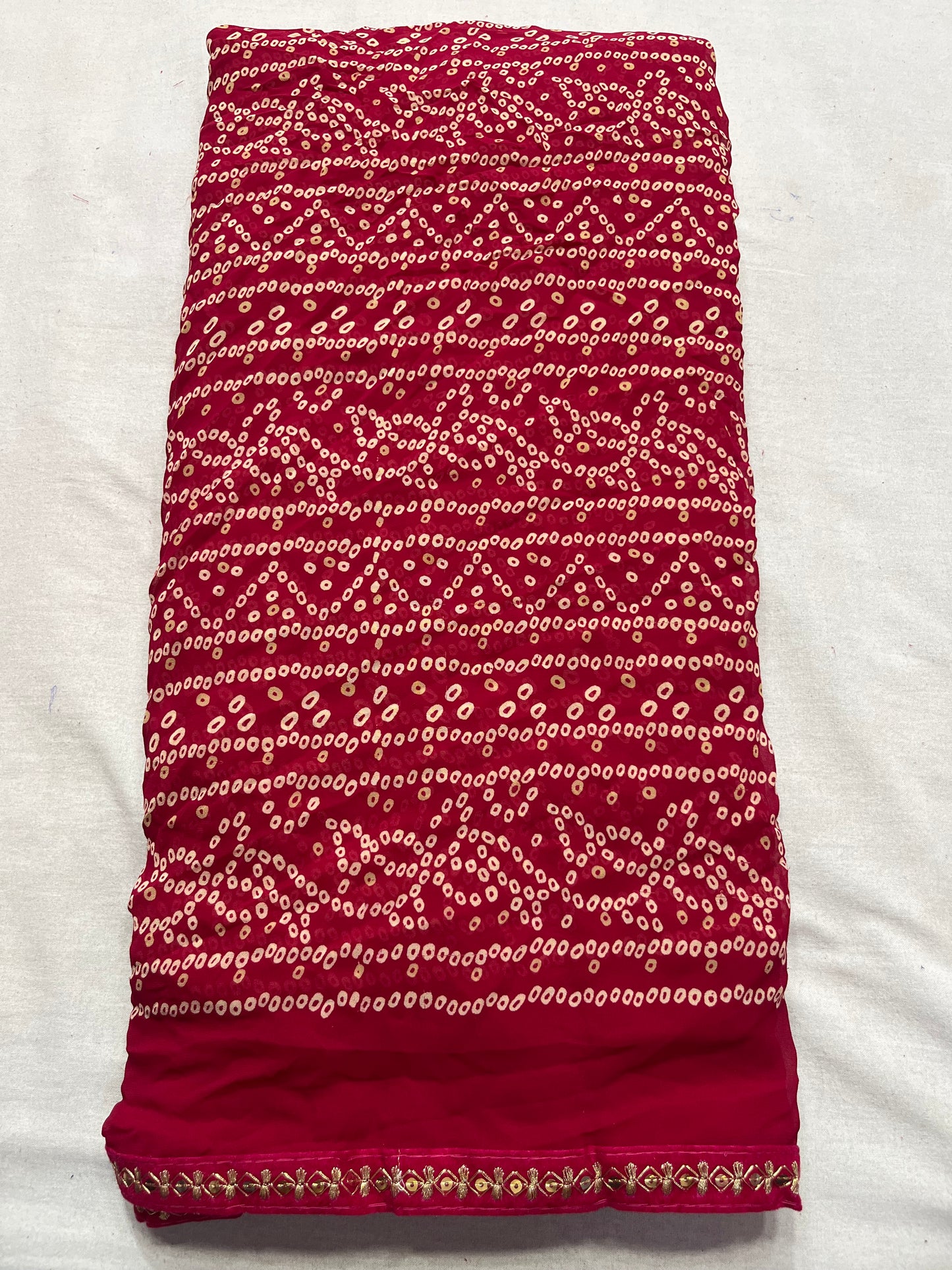 Traditional red bandej saree