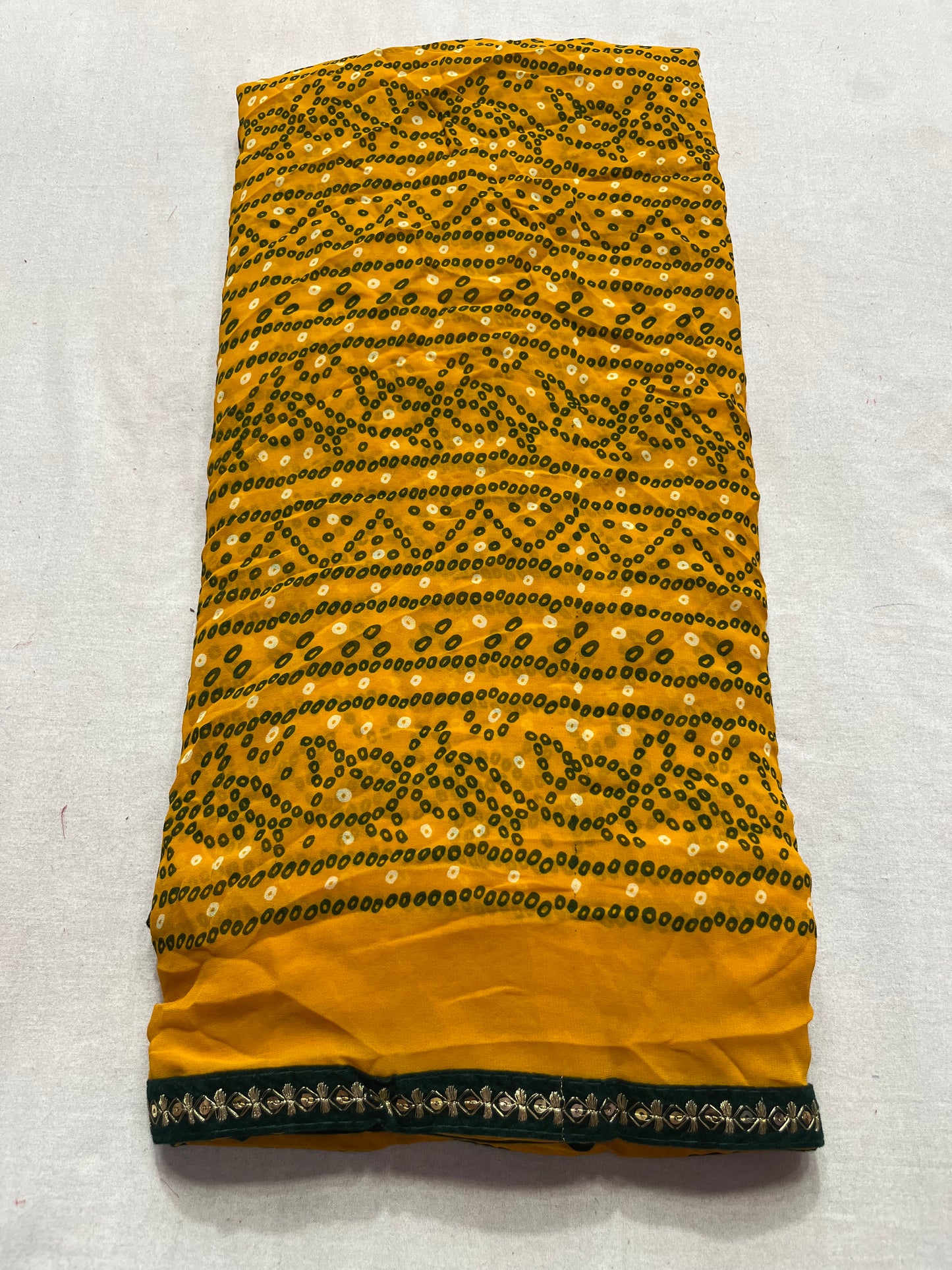 Traditional red bandej saree