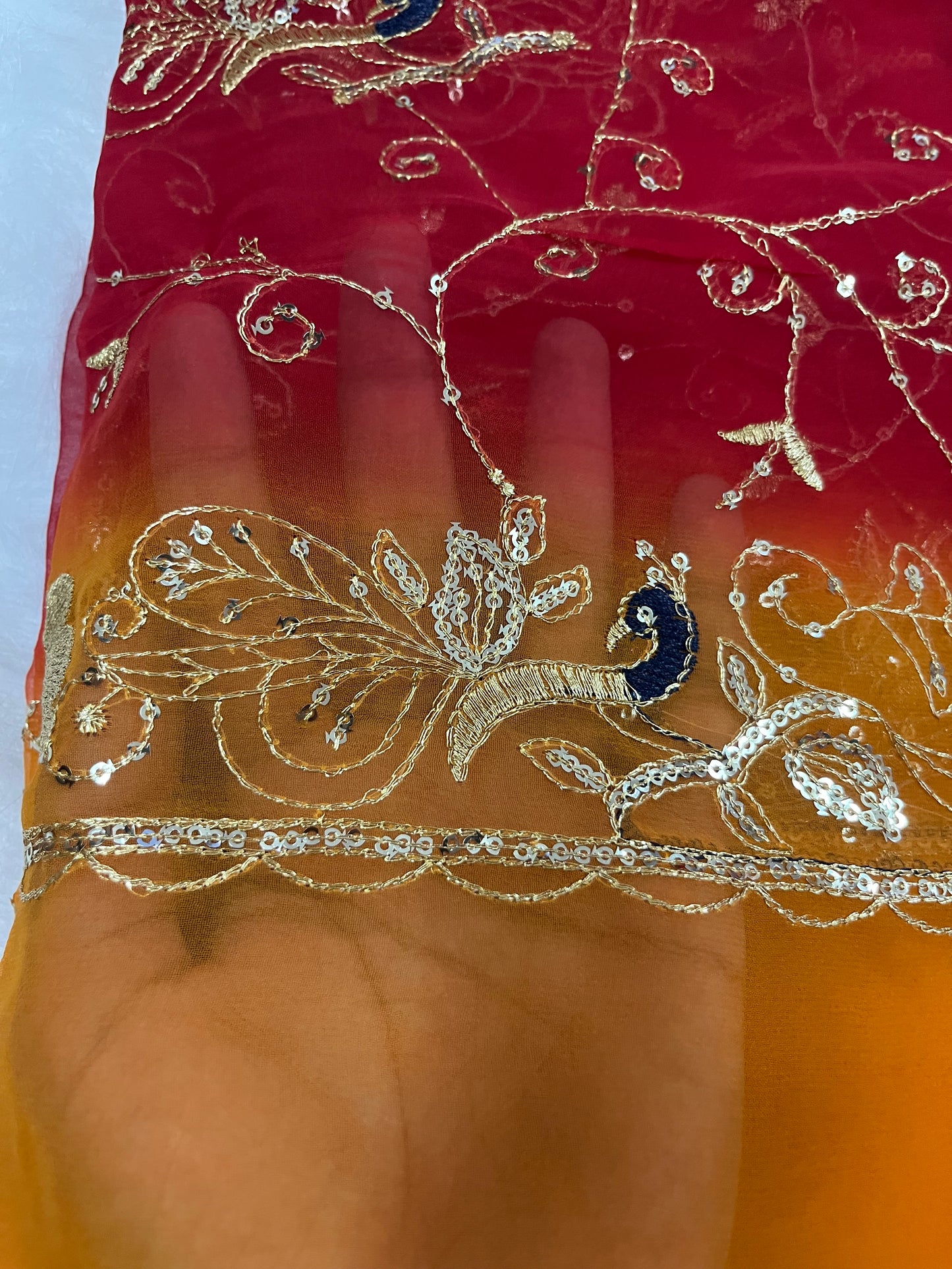 red and yellow mor jaal saree
