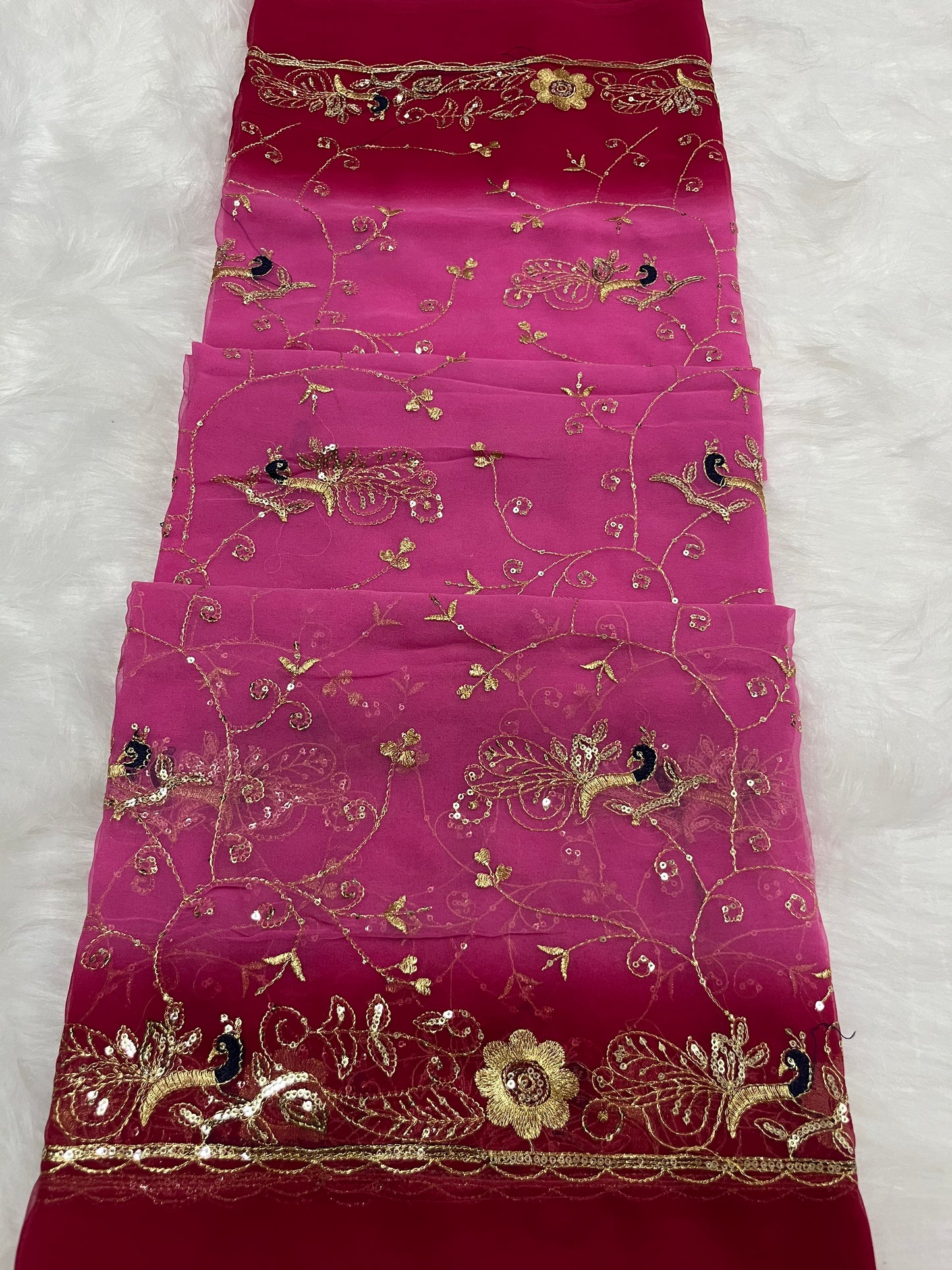 red and baby pink mor jaal saree