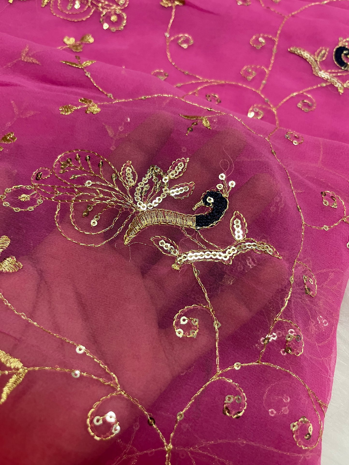 red and baby pink mor jaal saree