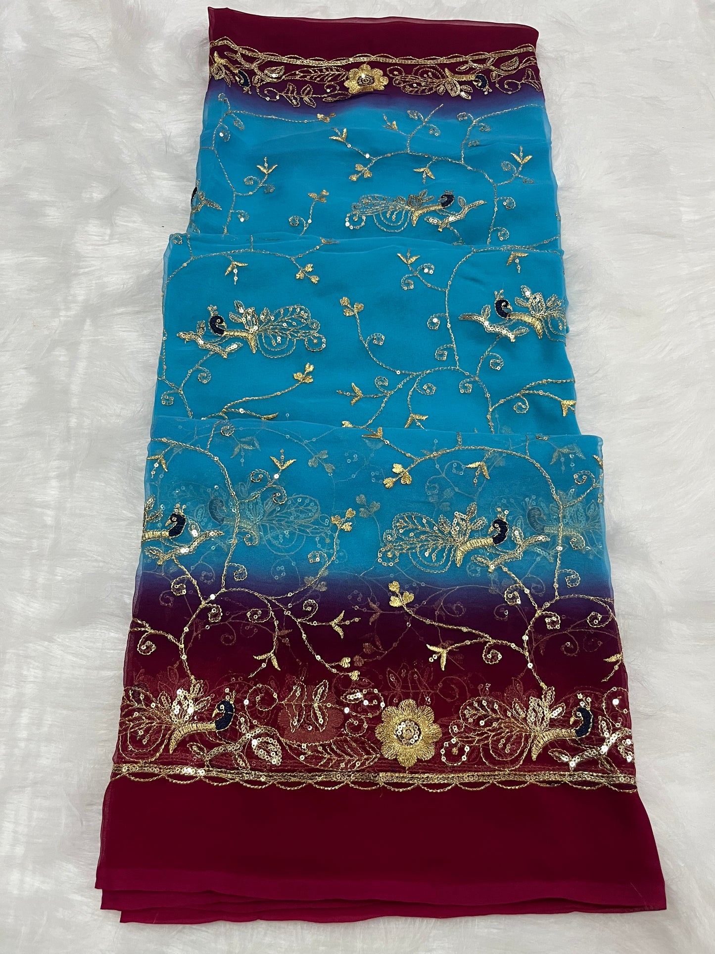 blue and rani shade mor jaal saree