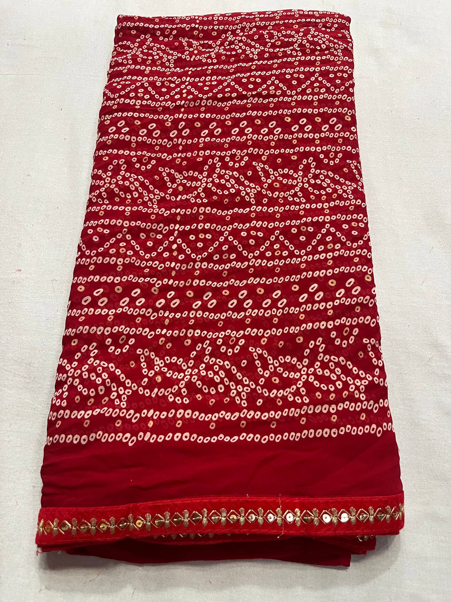 Traditional red bandej saree